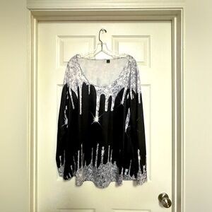 Women’s long sleeve holiday top. Size 3XL.  95% polyester, 5% spandex